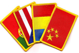 a picture of flag patches from four different countries